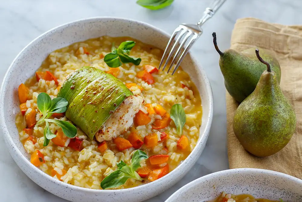 Kürbis-Risotto mit Birnen und gebratener Kabeljau im Lauchmantel